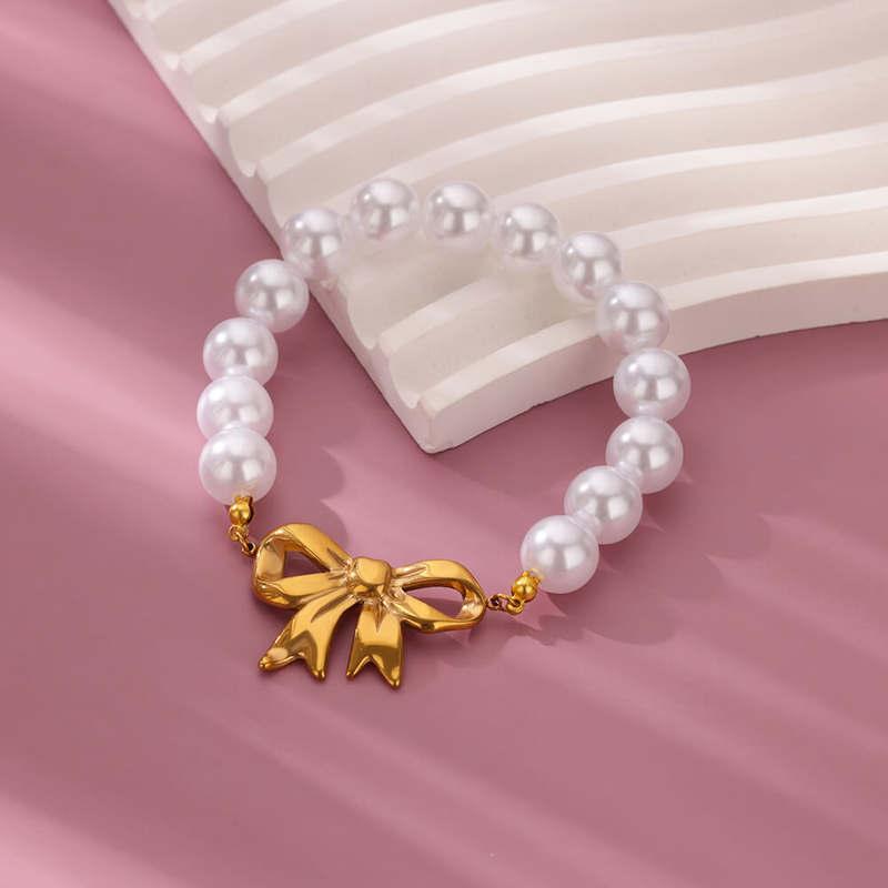 Gold Bowknot Bracelet with Imitation Pearls